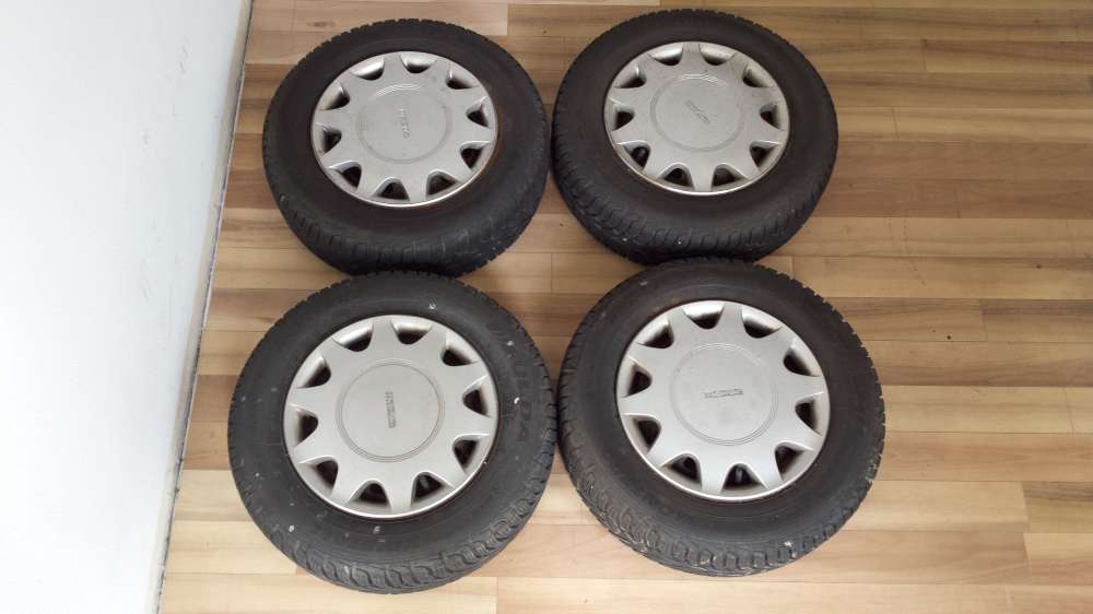 Komplettrder Winterreifen Mazda 323 BG 175/70 R13 82T Fulda ET45 mit Radkappen