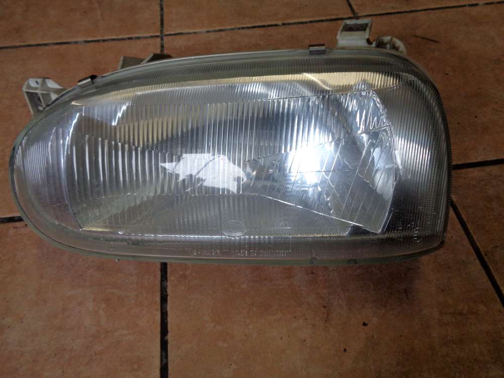 VW Golf III Scheinwerfer mit Stellmotor Links 144 875-00 