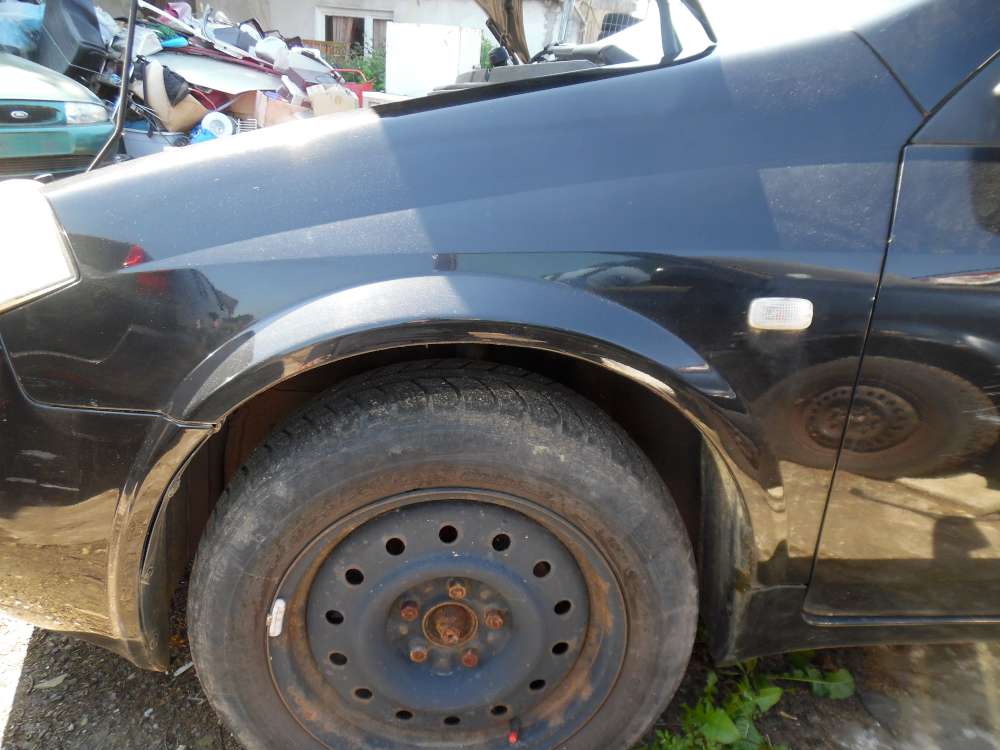 Nissan Primera P12 Kotflgel Vorne Links Schwarz 