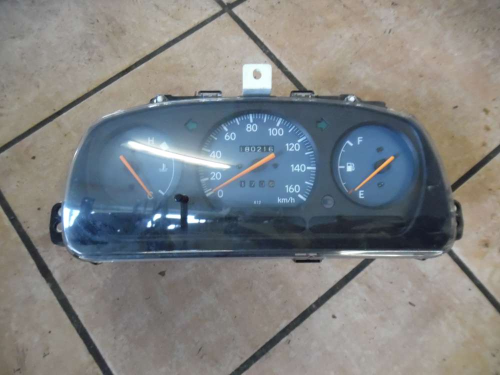 Daihatsu Cuore VI Tacho Kombiinstrument 8301097288 2573303290