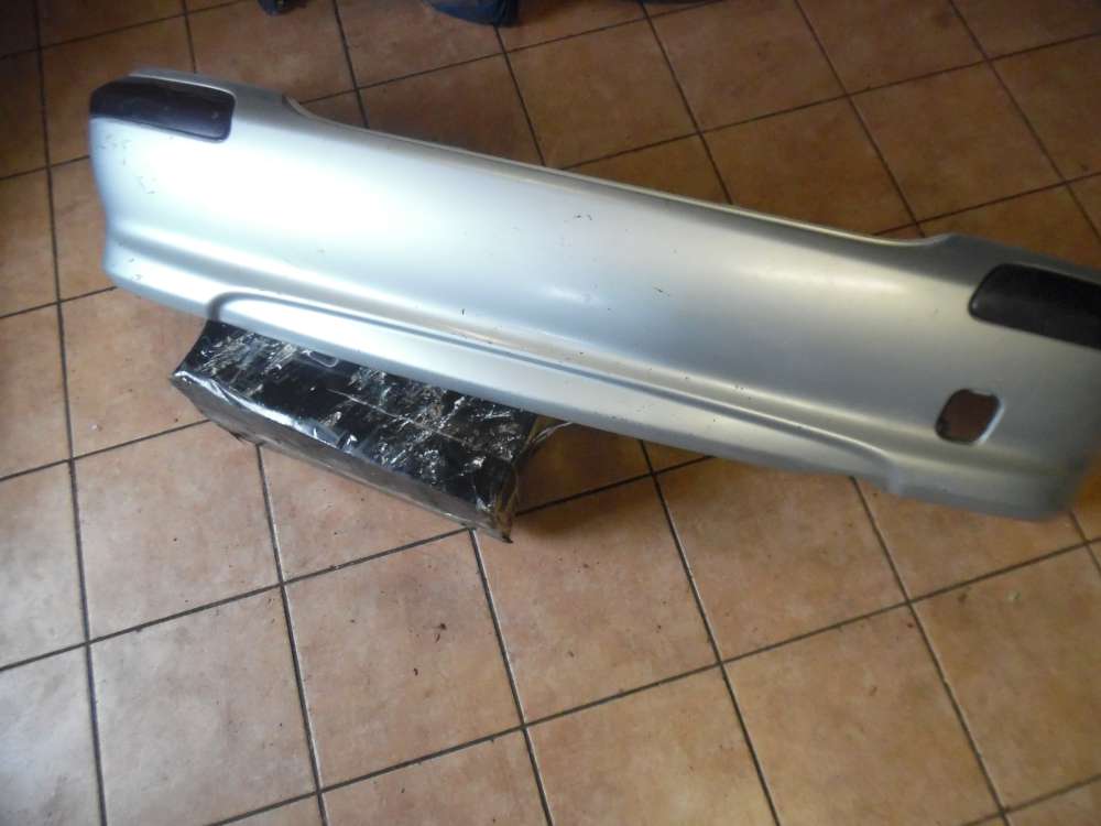 Nissan Almera II N16 Stostange Hinten 85022-4M540 Silber