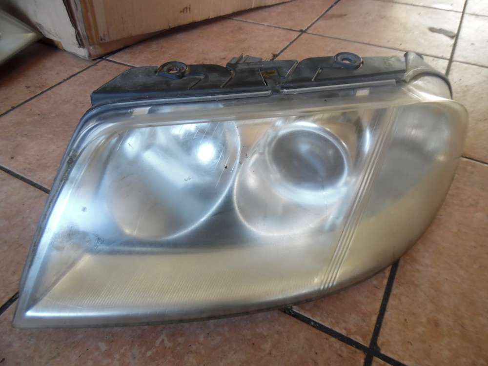 VW Passat 3B Scheinwerfer Links 3B0941015